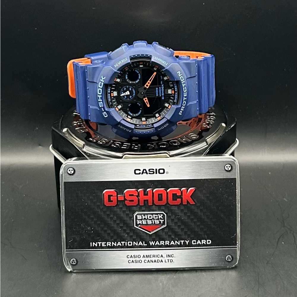 Casio G-Shock Men’s Ga-100L Blue & Orange Resin Watch With Box & Papers